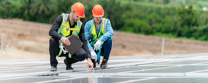 Technicians performing commercial roof inspection and repair in Aurora Nebraska with Tillotson Enterprises