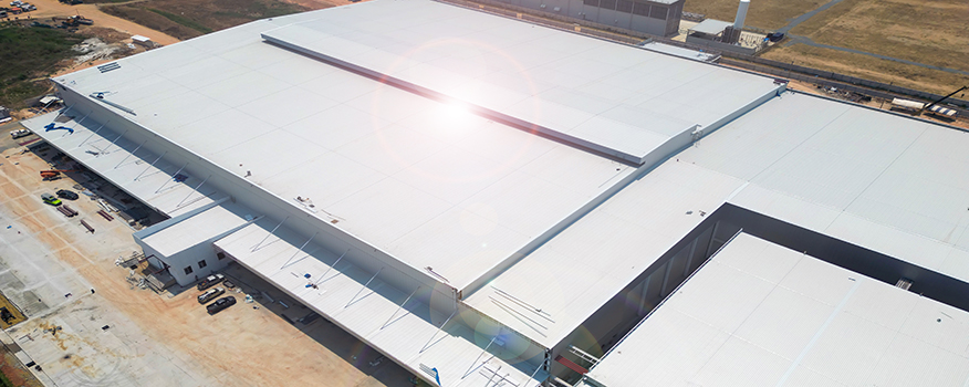 Commercial roof being evaluated for coating or replacement by Tillotson Enterprises in Nebraska