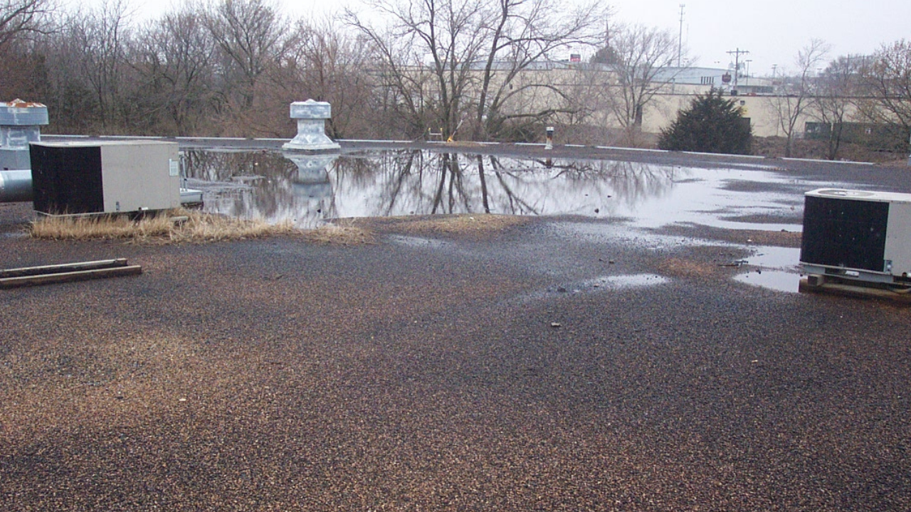 example of how freeze thaw cycle damages flat and low slope roof
