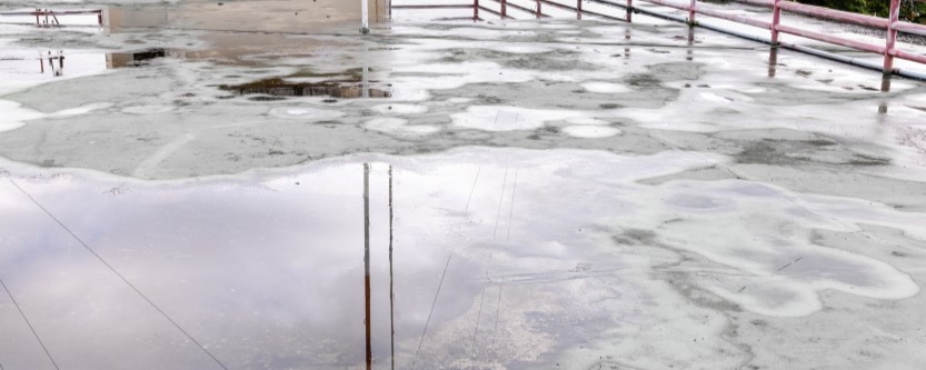 Why Ponding Water Is the Biggest Threat to Flat Commercial Roofs in Omaha, NE